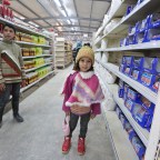 A new way to feed Syrian war refugees: supermarkets and cash cards